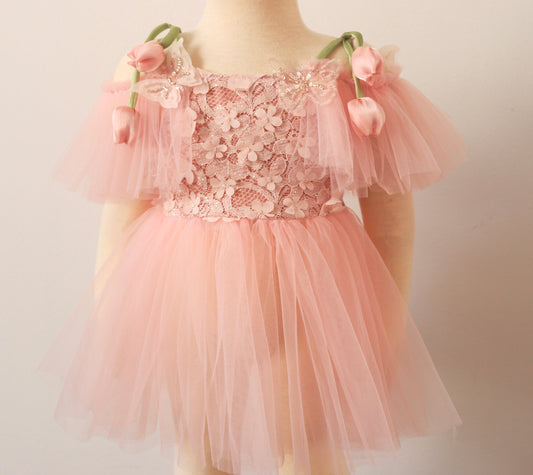Fairy-inspired pink toddler dress with tulle skirt, tulip-style straps, and matching bloomer for special occasions