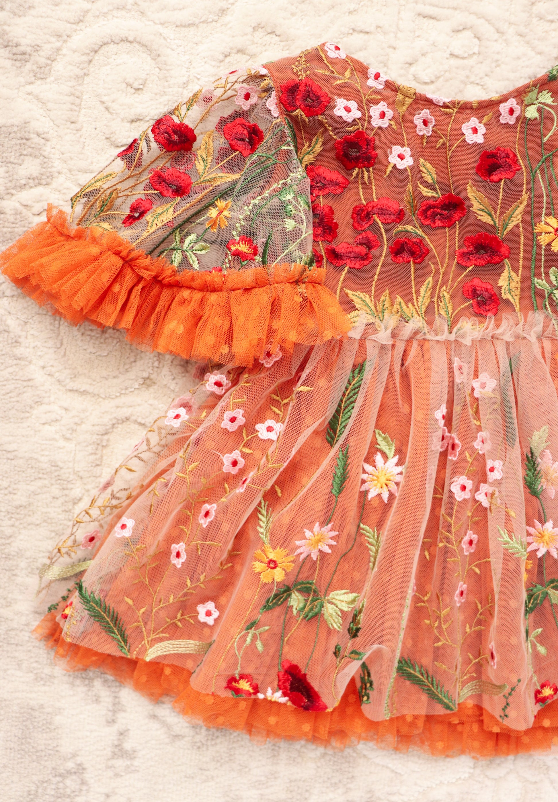 Girl embroidered photo prop dress with red and pink floral embroidery and orange tulle trim by FLEUR MARGOT