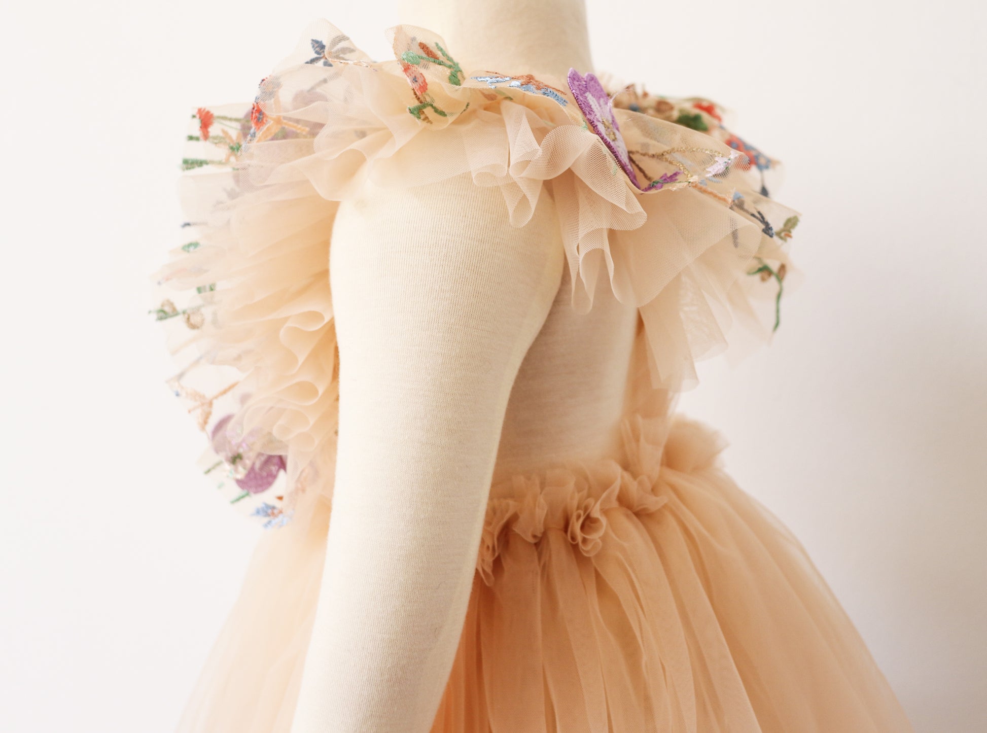 Beige tulle dress with floral embroidered ruffles for infant portrait session clothing by Fleur Margot