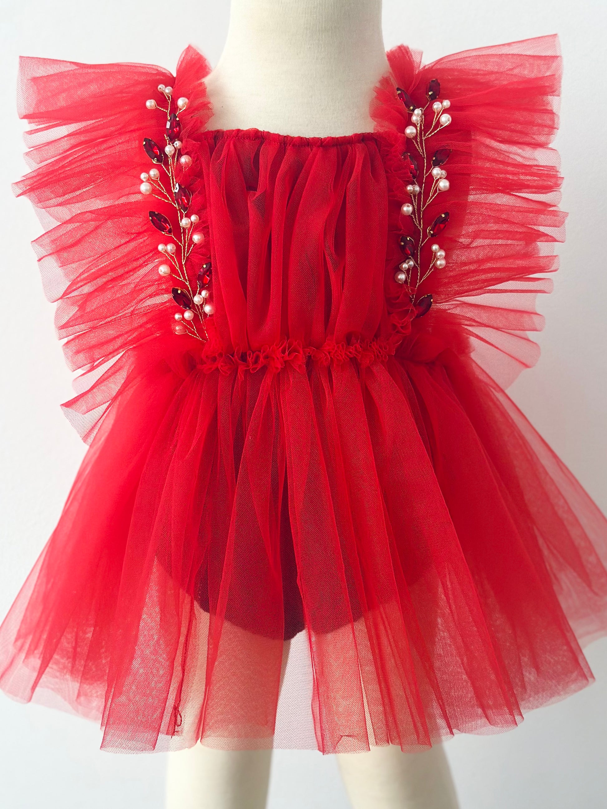 Red infant rhinestone Christmas outfit with tulle skirt and pearl embellishments by FLEUR MARGOT
