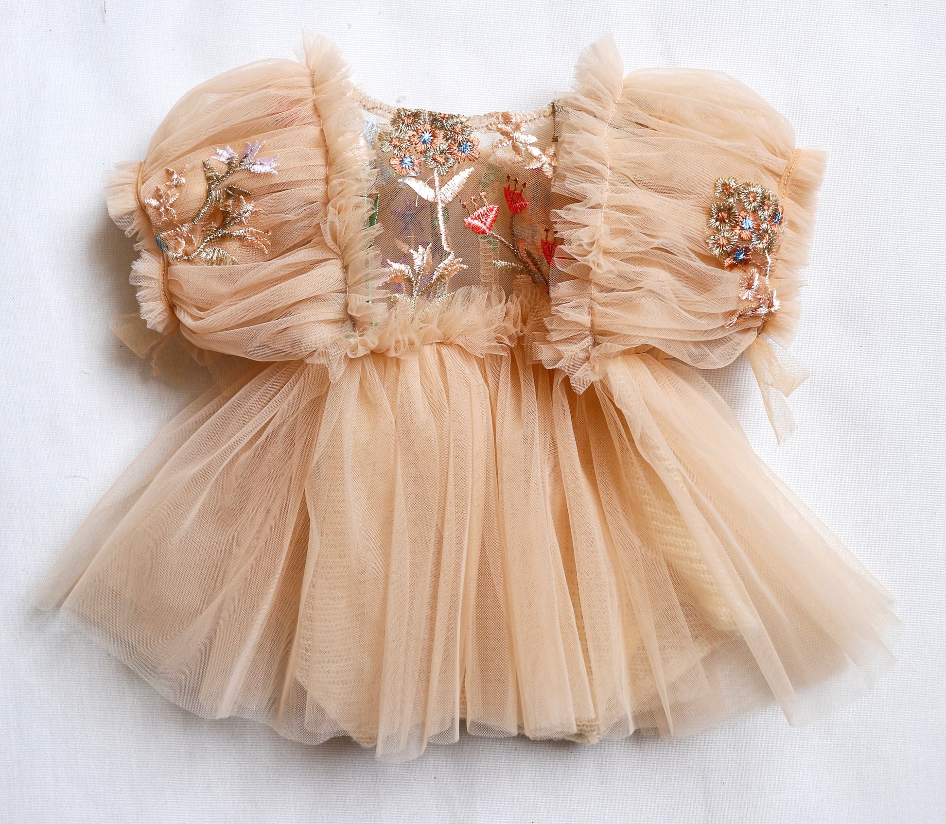 Fleur Margot beige newborn photoshoot dress with puff sleeves and floral embroidery details