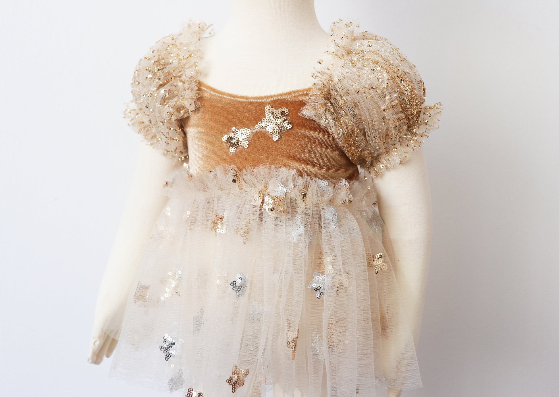 FLEUR MARGOT photography prop dress for girls with gold and silver star embellishments and tulle skirt