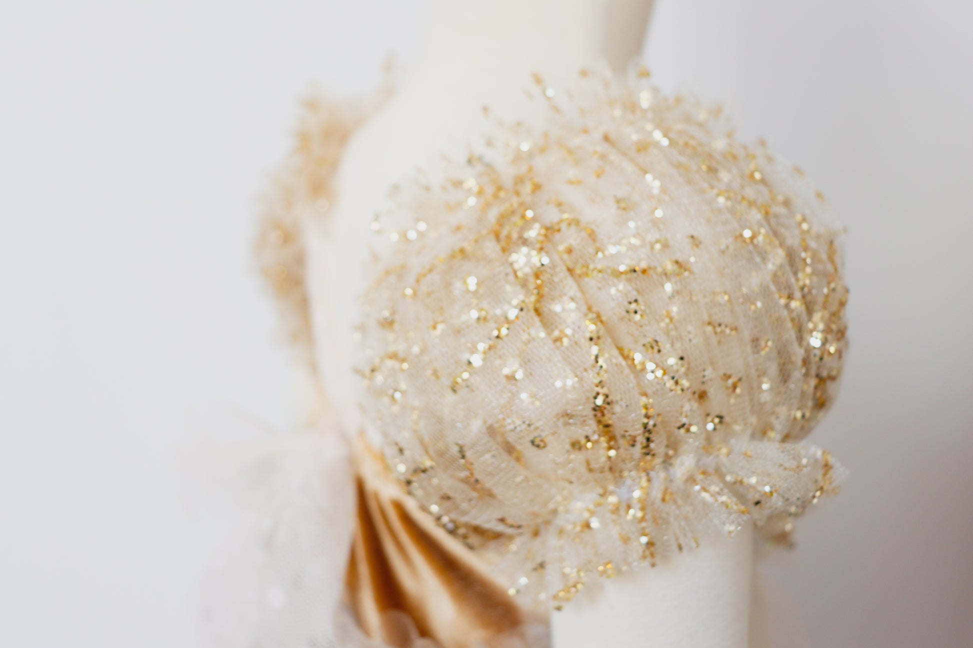 Elegant photography prop dress for girls with shimmering gold and soft tulle detailing