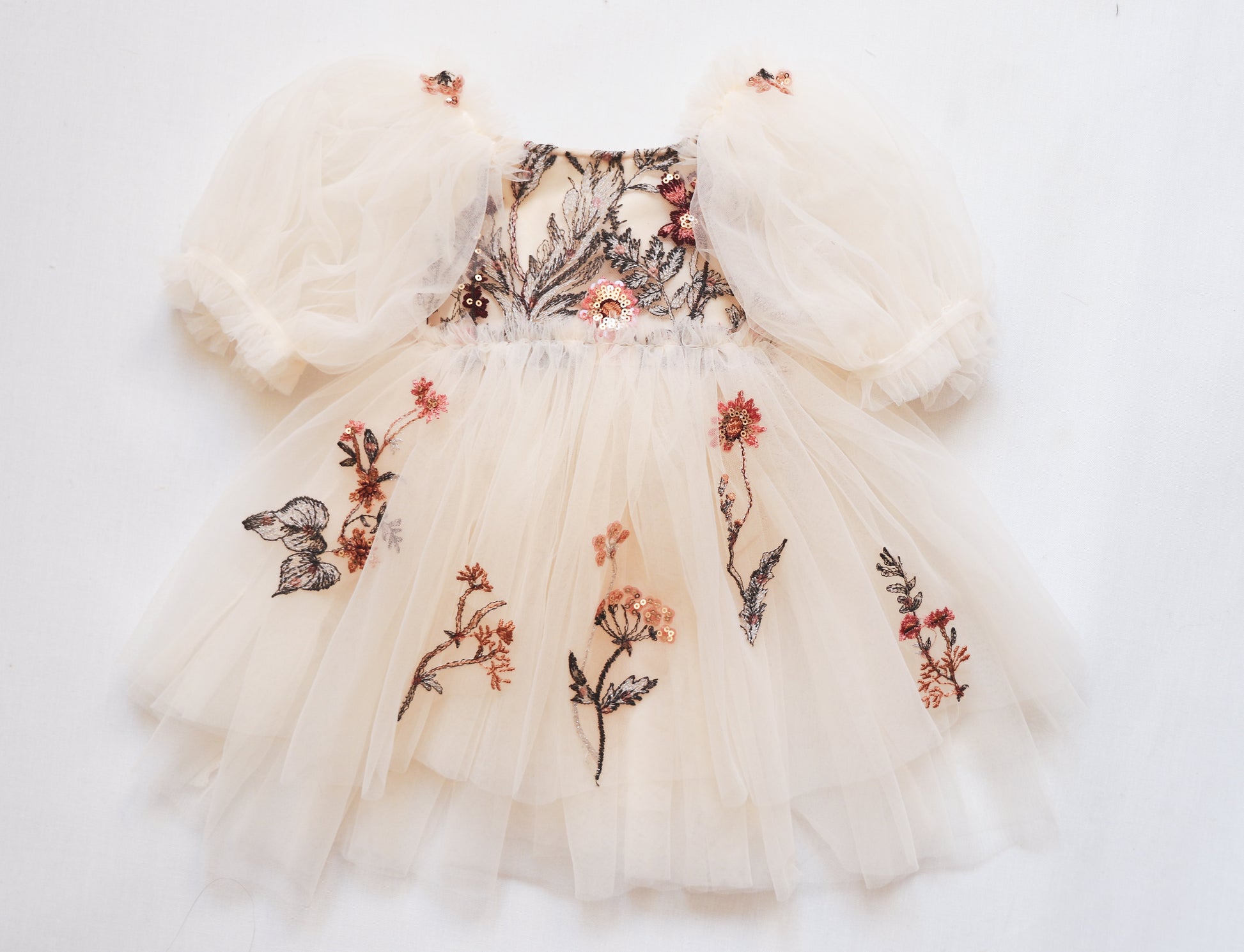 Infant lace dress for photoshoot by FLEUR MARGOT with puff sleeves and floral embroidery