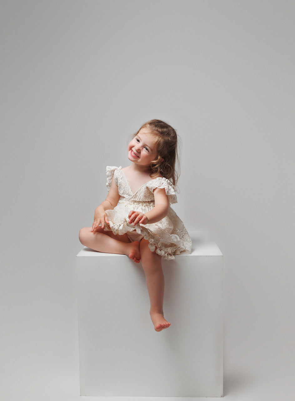 Girl’s dress with two vintage lace patterns and shell fringe, perfect for a boho look