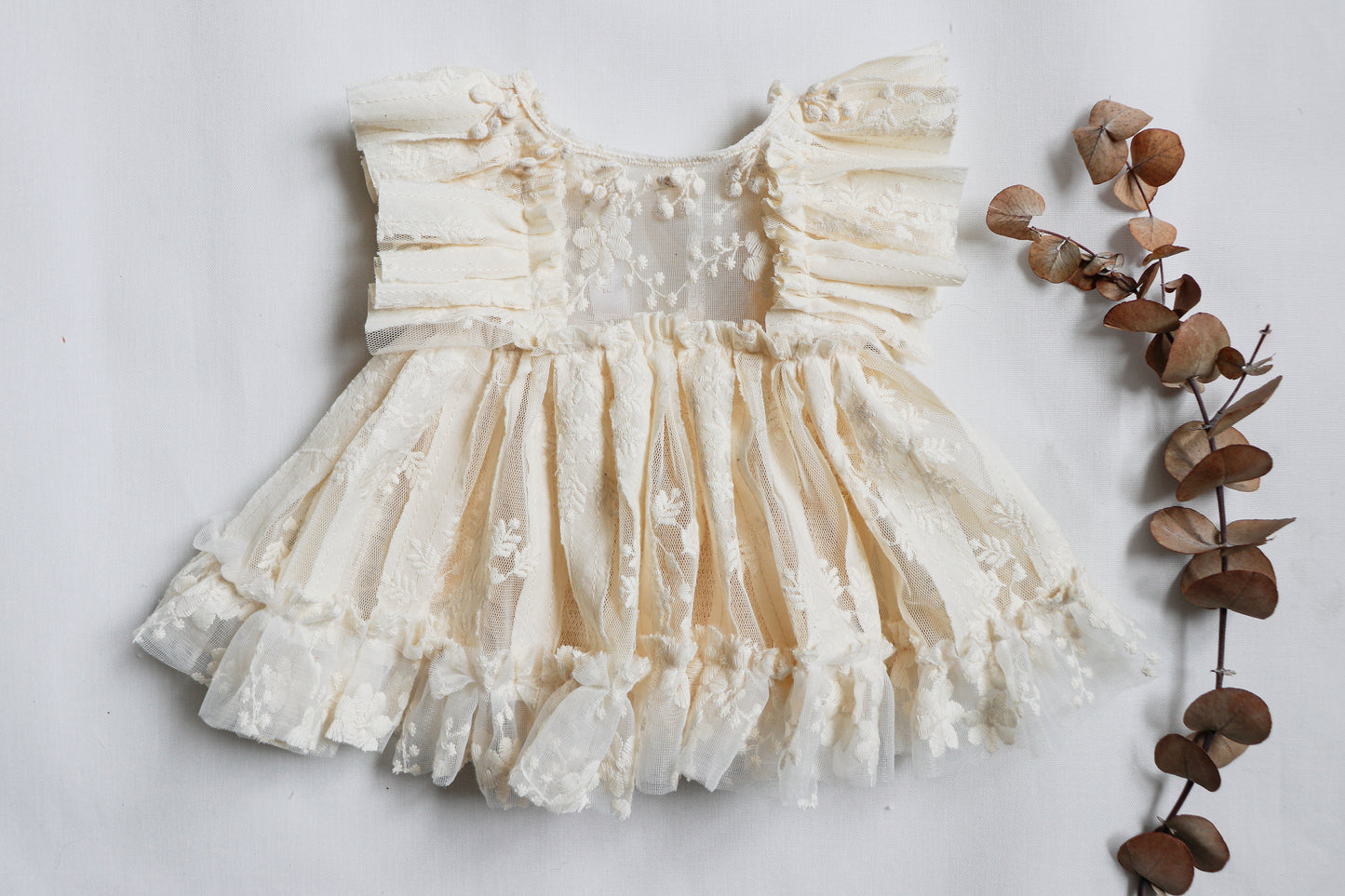Why Choose Our Boho Newborn Girl Romper?

Designed with love and care, this romper is a celebration of delicate craftsmanship and comfort. The soft textures and intricate lace create a dreamy bohemian look while ensuring your baby stays cozy. Whether you're planning a professional newborn photoshoot, a family gathering, or simply want a beautiful keepsake, this romper offers a perfect blend of style and function.

Care Instructions:
Hand wash gently with cold water. Lay flat to dry to preserve the delicate 