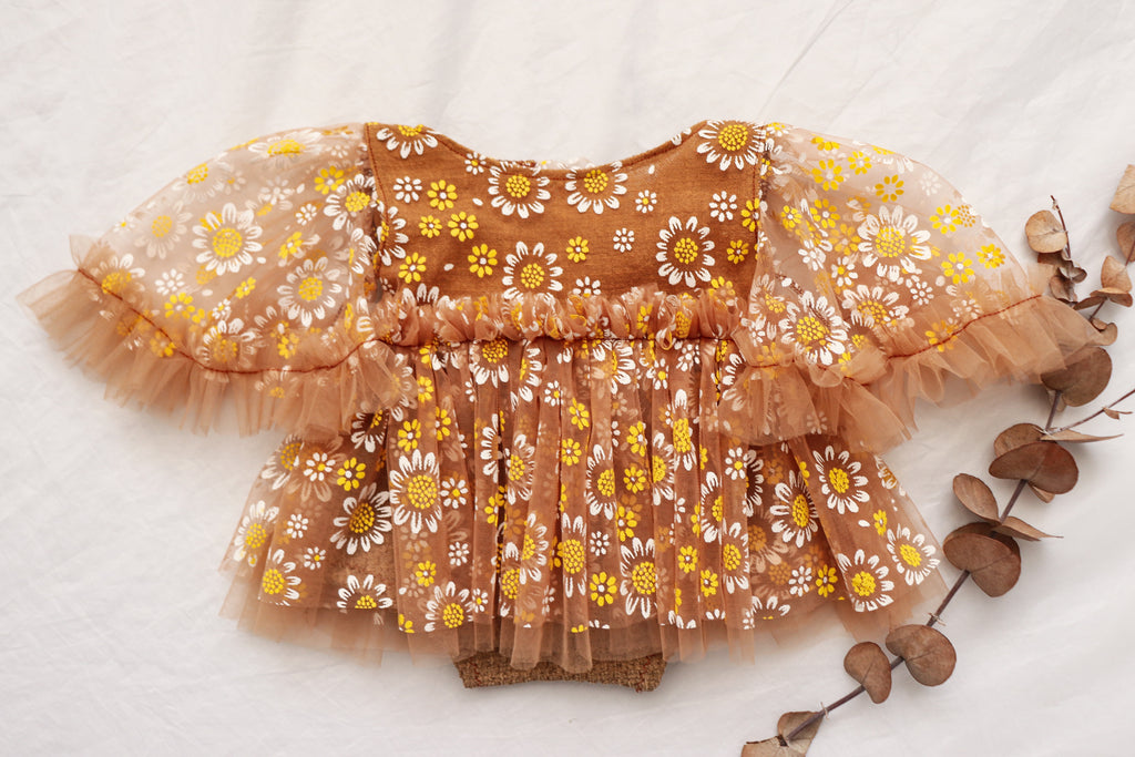 FLEUR MARGOT handmade newborn photography prop with brown and yellow floral dress and puff sleeves